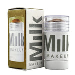 Load image into Gallery viewer, Milk Makeup Cream Highlighter Stick - Shade SPARK - 0.24 oz / 6.7 g | Luminous &amp; Dewy
